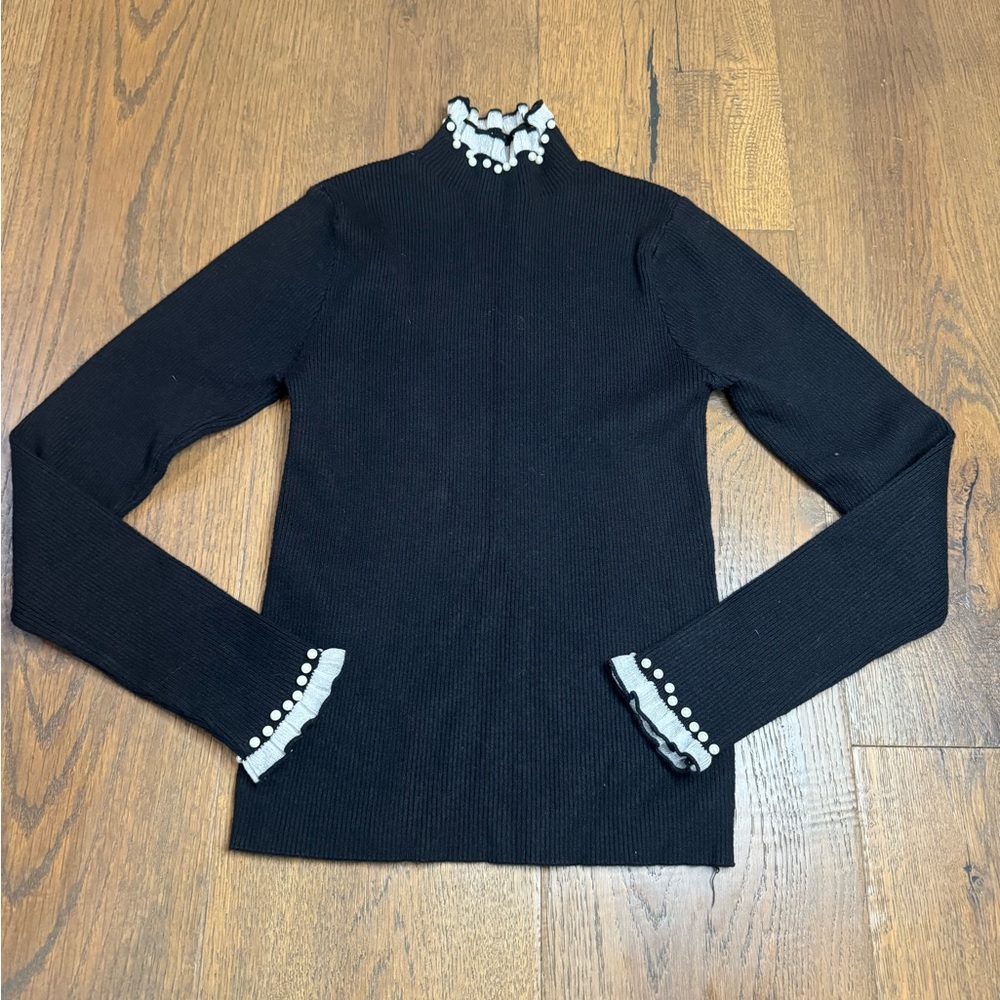 Black Turtleneck Sweater with Ruffle Trim